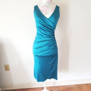 Pin up girl clothing teal dress rockabilly